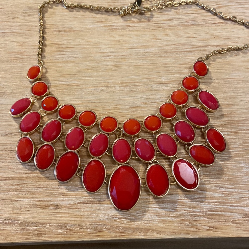 Costume Jewelry- red and pink layered necklace on gold chain